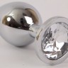 Серебристая анальная пробка с прозрачным стразом - 9,5 см.