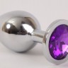 Серебристая анальная пробка с фиолетовым стразом - 8,2 см.