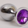 Серебристая анальная пробка с фиолетовым стразом - 9,5 см.