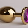 Золотистая анальная пробка с фиолетовым кристаллом - 9,5 см.